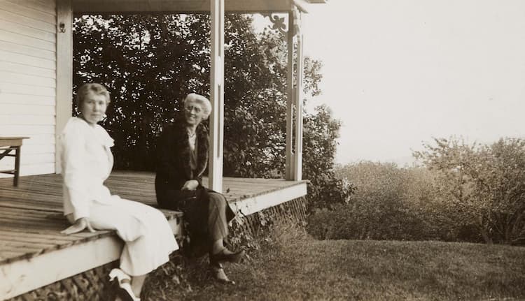 Theresa Eliot and Marian Eliot sitting on the porch of Mountain View House Randolph, N.H., June 1933.