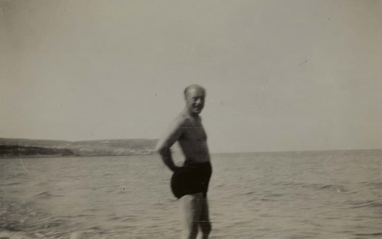 Geoffrey Faber paddling in the sea, Wales, ca. August–September 1933.